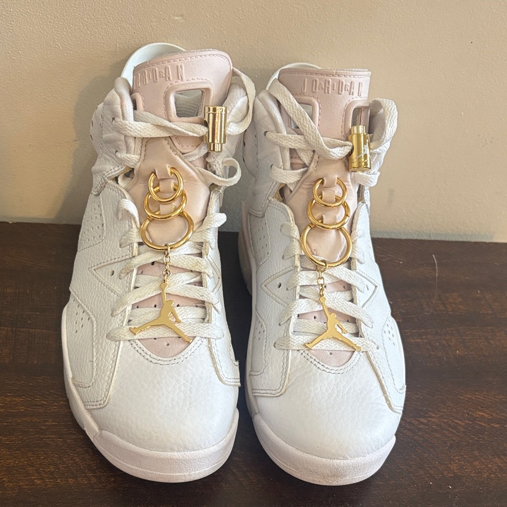 Jordan Women's White and Light Pink Sneakers with Gold Accents